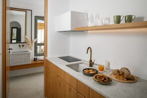 Fridge, coffee/tea maker, electric kettle, toaster