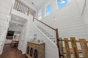 Sun-filled spaces, soaring ceilings, and beautiful coastal finishes set the tone for an unforgettable beach getaway. - Heated Pool | Golf Cart | Game Room | Fire Pit (Jacksonville Beach)