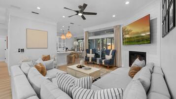 Smart TV, fireplace, DVD player, foosball