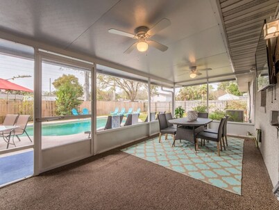 Cottage Home with Heated Pool and Screened in Porch.