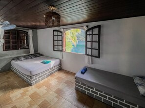 Economy Quadruple Room | Free WiFi, bed sheets - Eco Pousada Tapera das Palmas (Angra dos Reis)