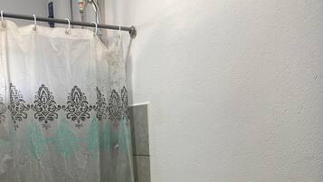 Shower, towels, soap, shampoo