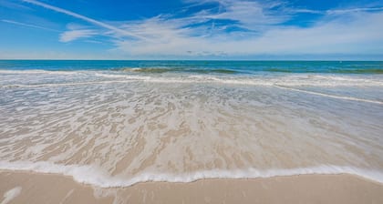 Right on the beach. Relax and unwind in this top floor resort suite sleeps 6 max