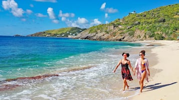 On the beach, sun-loungers, beach towels, beach massages