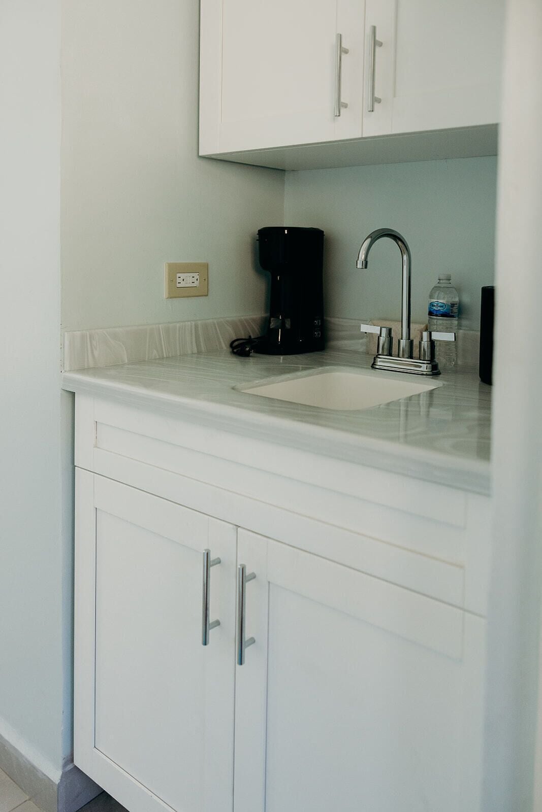 villa, 1 king bed, beach view, beachside | private kitchen | mini-fridge, microwave, coffee/tea maker, high chair