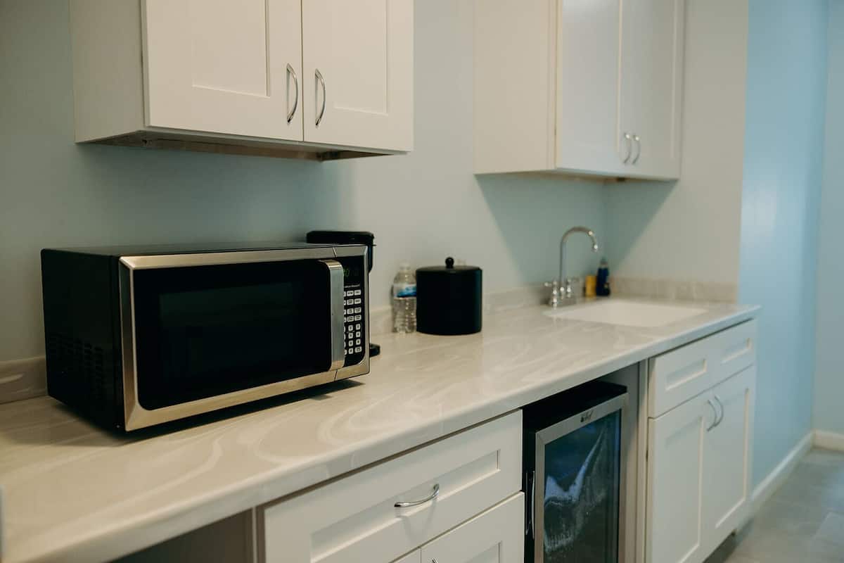 mini-fridge, microwave, coffee/tea maker, high chair