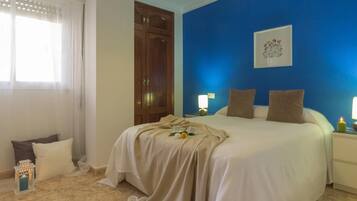 1 bedroom, desk, iron/ironing board, travel cot