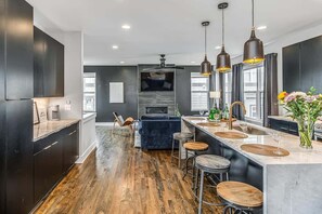 Fridge, coffee/tea maker, cookware/dishes/utensils