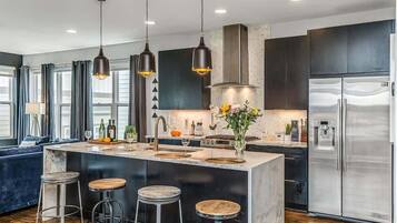 Fridge, coffee/tea maker, cookware/dishes/utensils