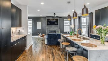 Fridge, coffee/tea maker, cookware/dishes/utensils