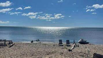 On the beach, sun loungers