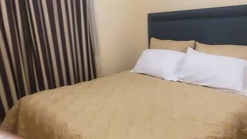 2 chambres, fer et planche à repasser, Wi-Fi, draps fournis