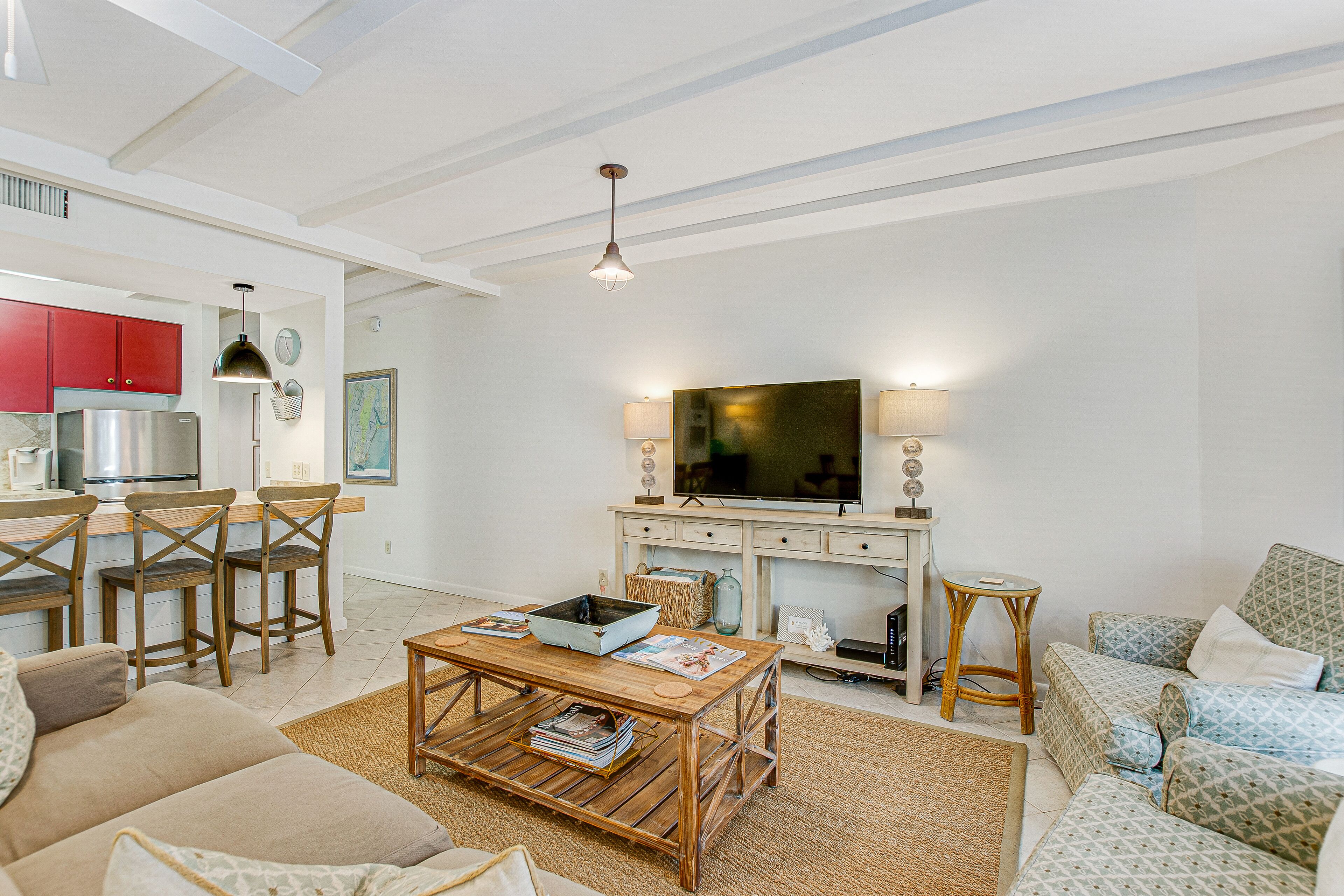 Two-story condo near the ocean with large deck, patio, W/D, & free WiFi