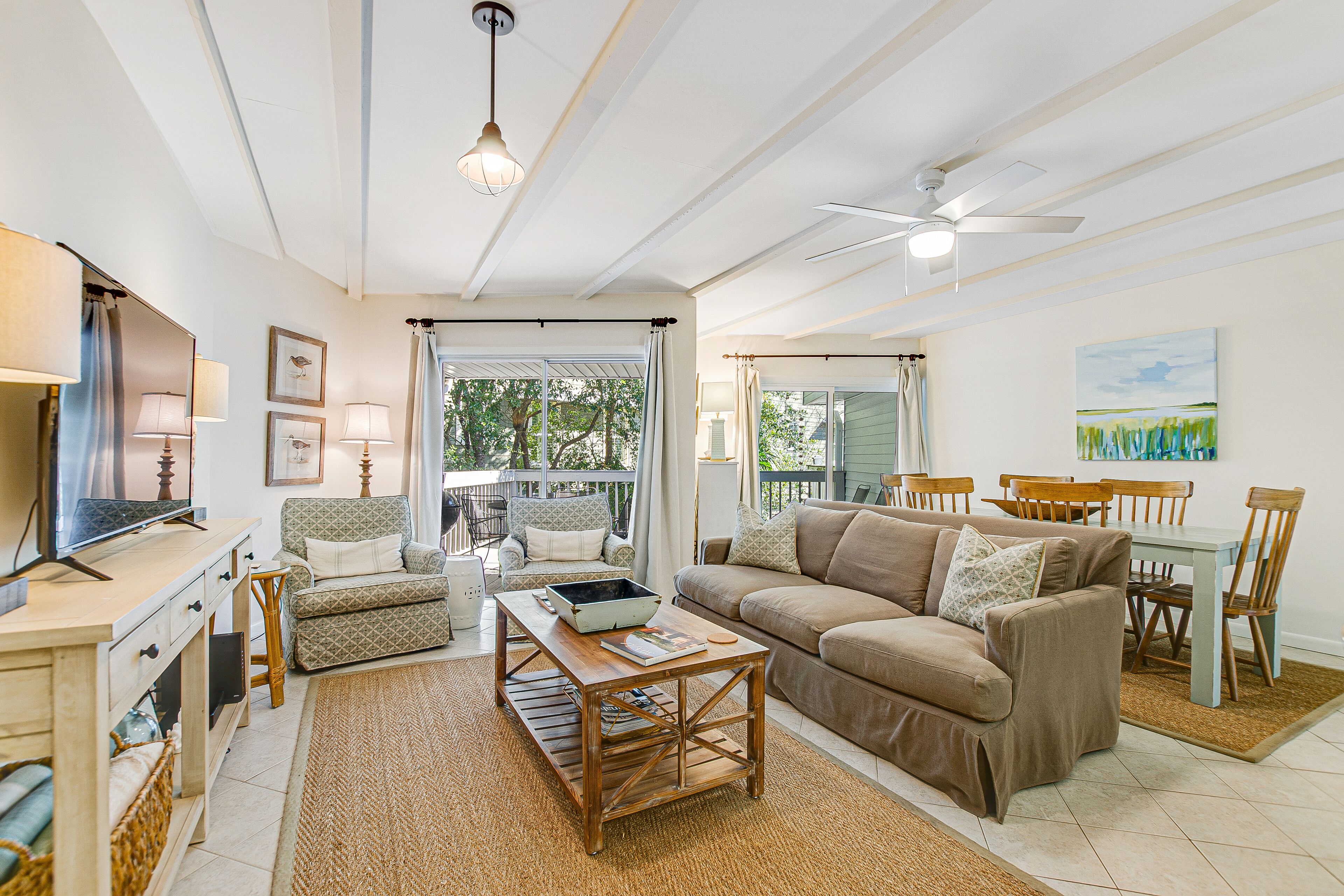 Two-story condo near the ocean with large deck, patio, W/D, & free WiFi