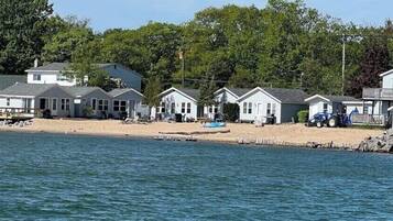 Beach nearby, sun loungers
