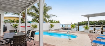 Waterfront home with dock, pool table & private pool - walk to Sombrero Beach
