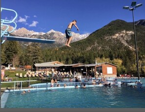 Outdoor pool, a heated pool - Bears Den, sleeps 6, lakefront, amazing location, sun deck overlooking pool/lake (Invermere)