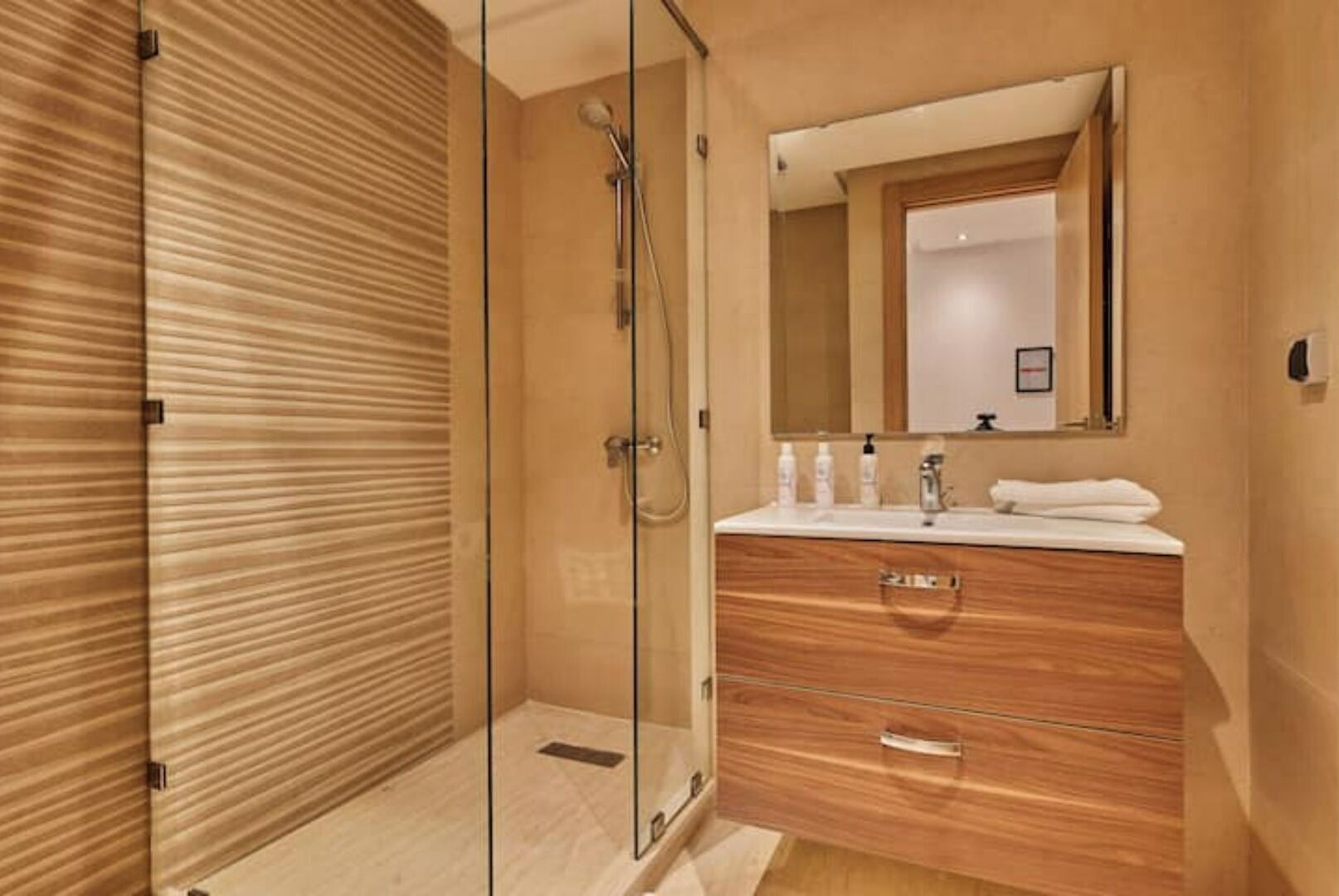 Shower, towels, soap, toilet paper