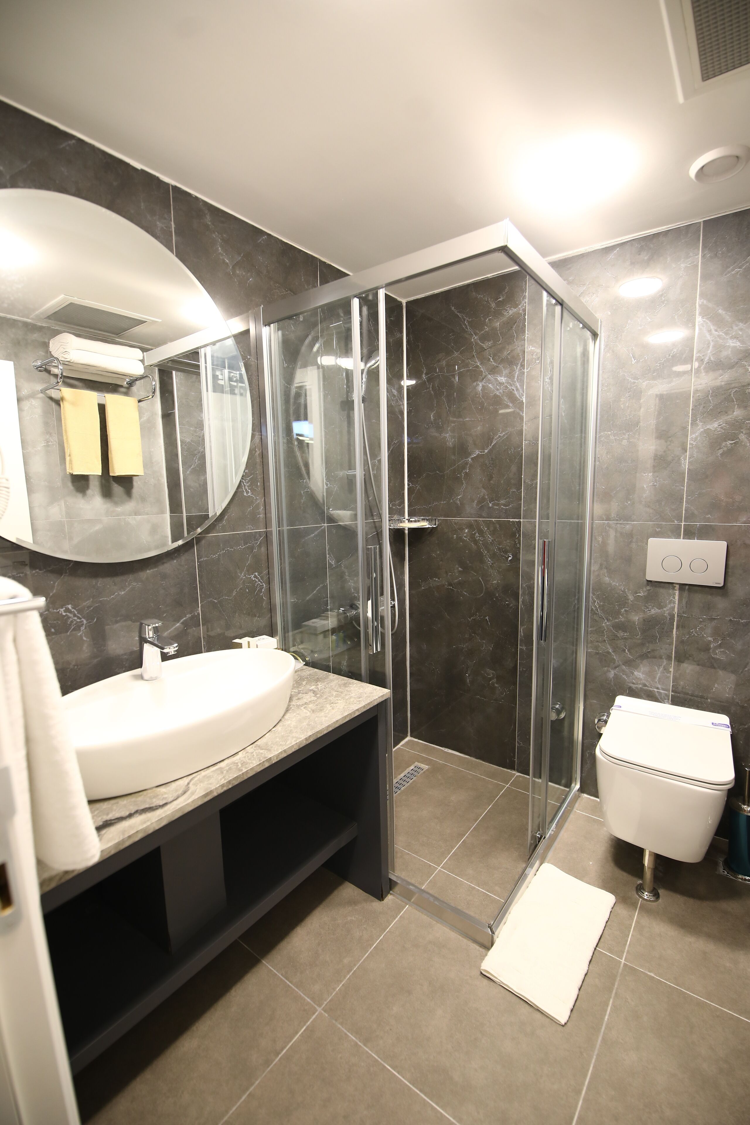 shower, rainfall showerhead, hair dryer, slippers