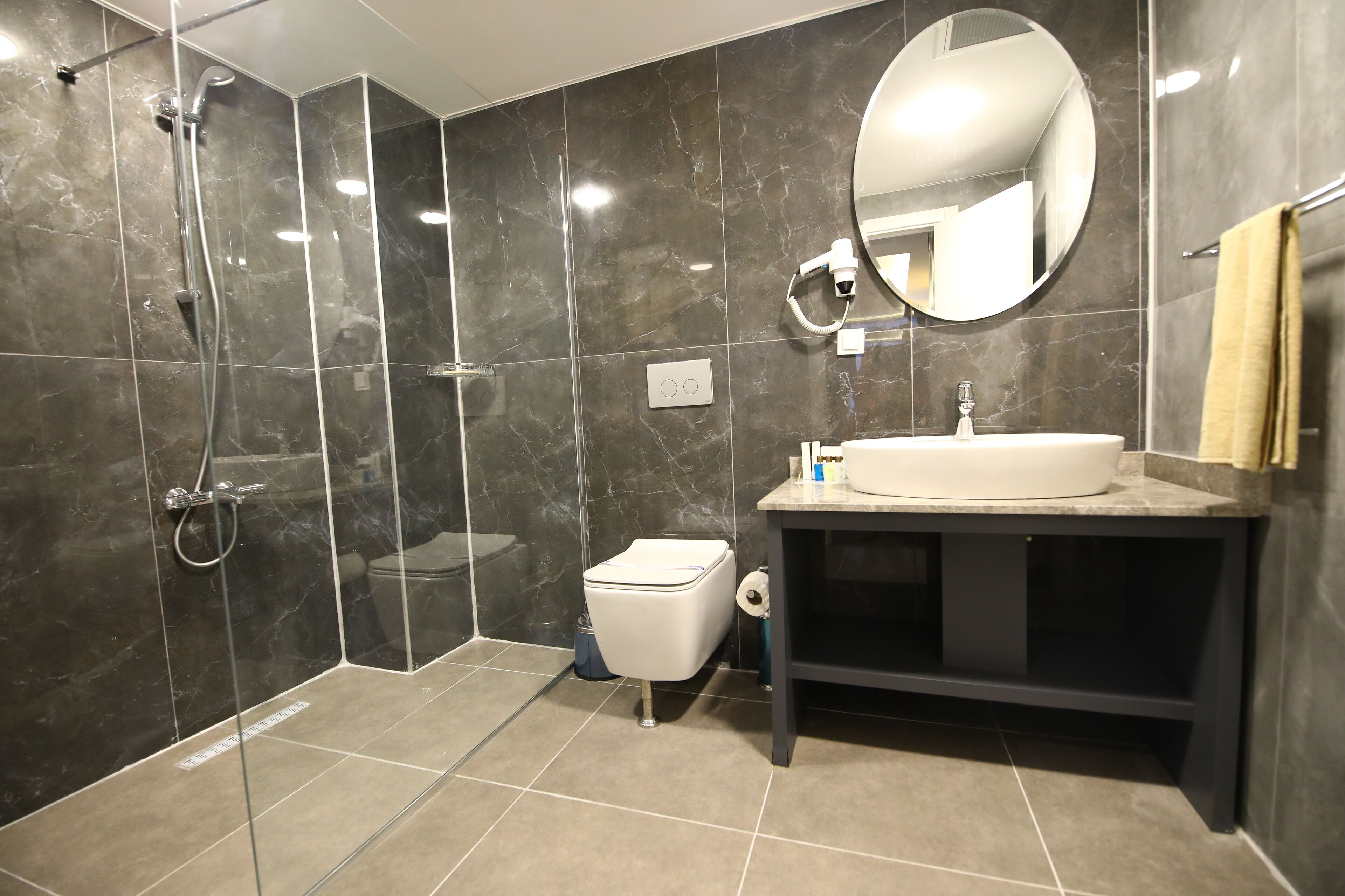 shower, rainfall showerhead, hair dryer, slippers