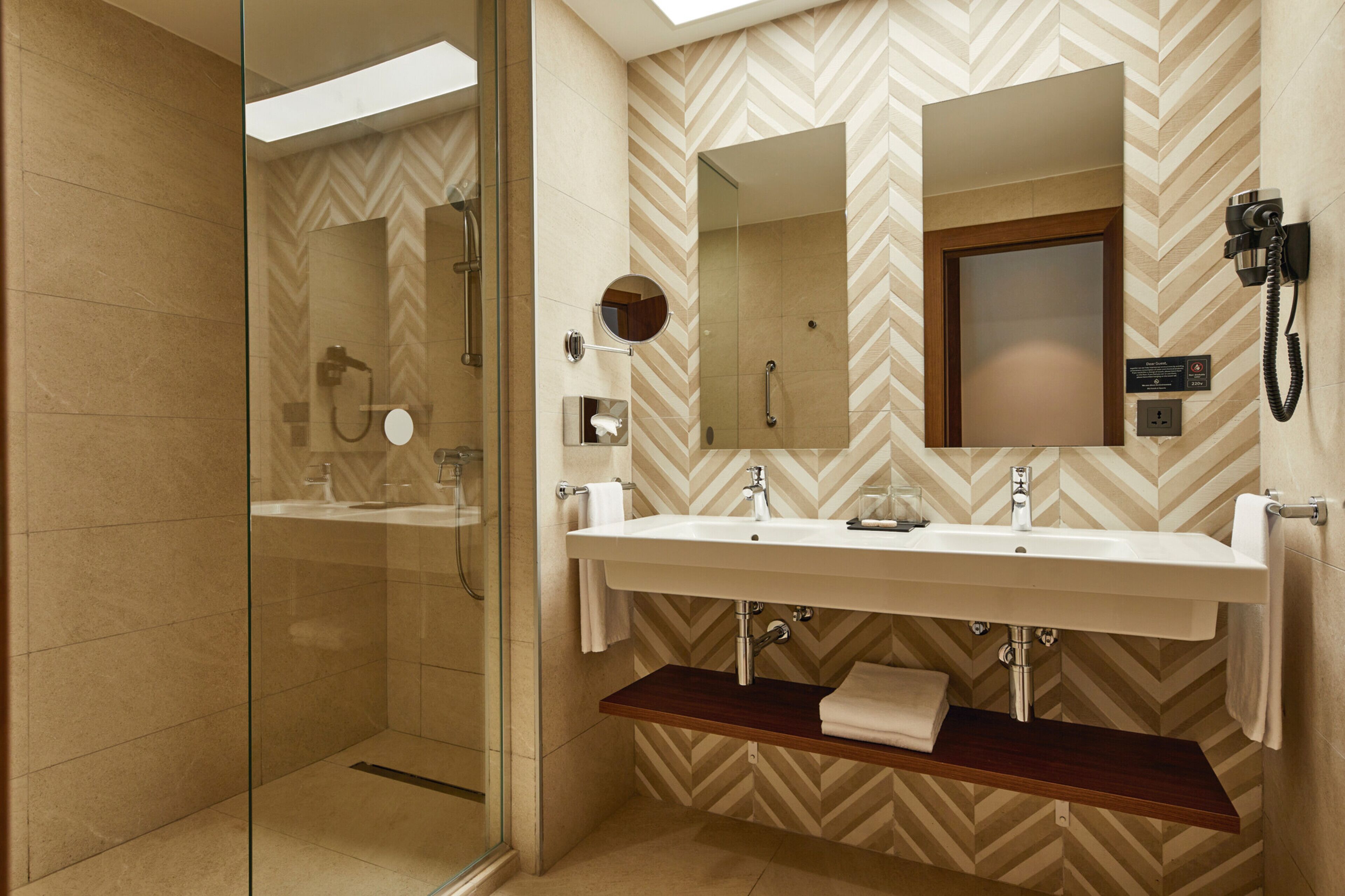 shower, eco-friendly toiletries, hair dryer, towels