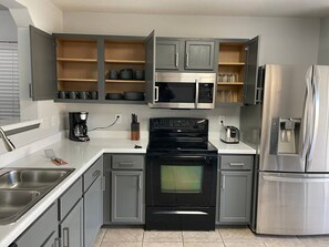 Fridge, microwave, oven, stovetop - Inviting 3BR 2BA Home Near JW Marriott & TPC Bulverde (San Antonio)
