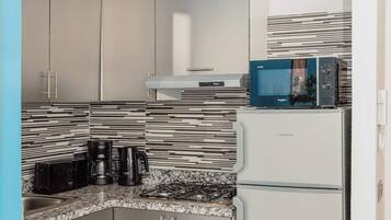 Fridge, microwave, coffee/tea maker, electric kettle