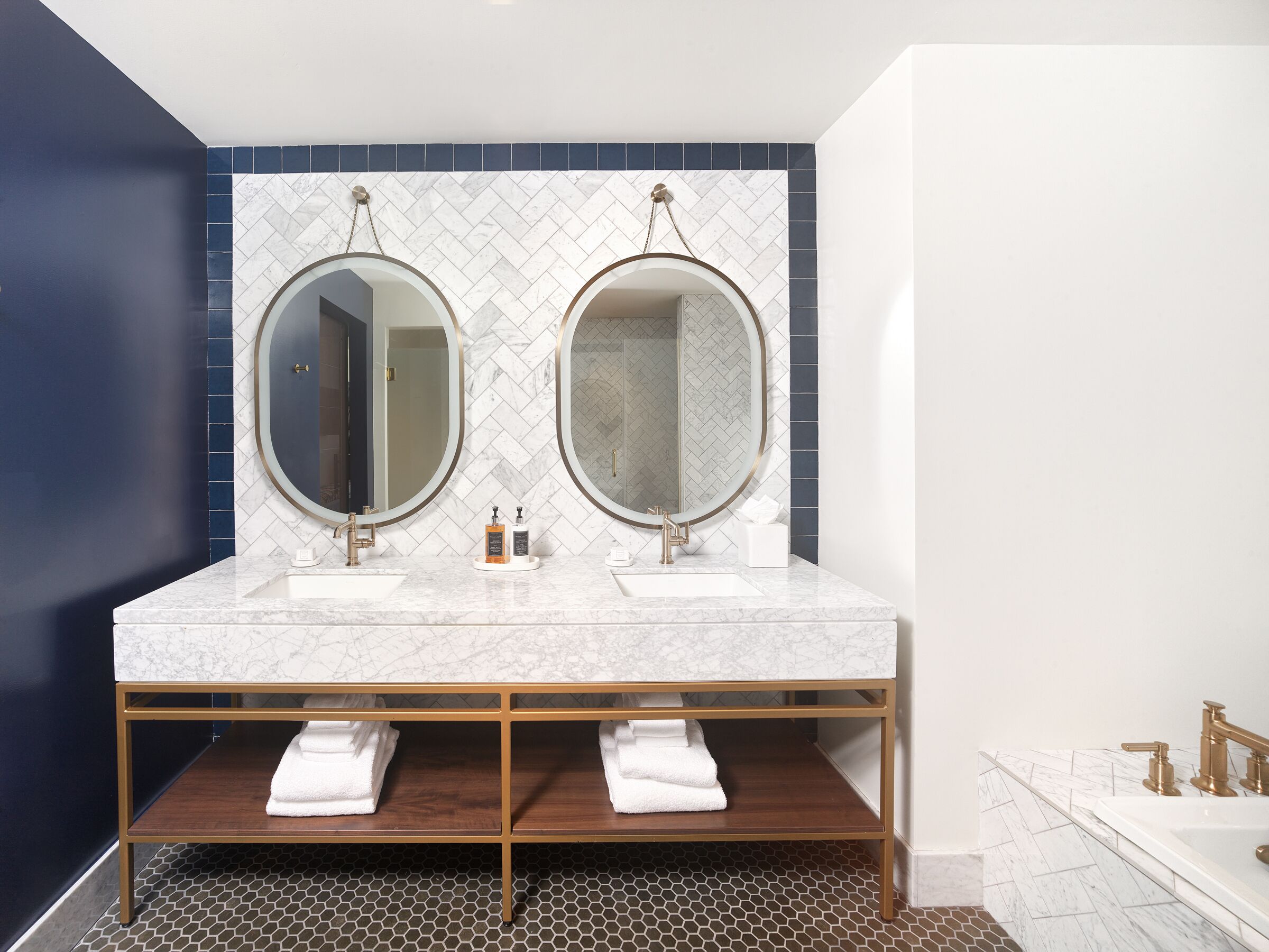 Premier King Suite | Bathroom | Designer toiletries, hair dryer, bathrobes, slippers