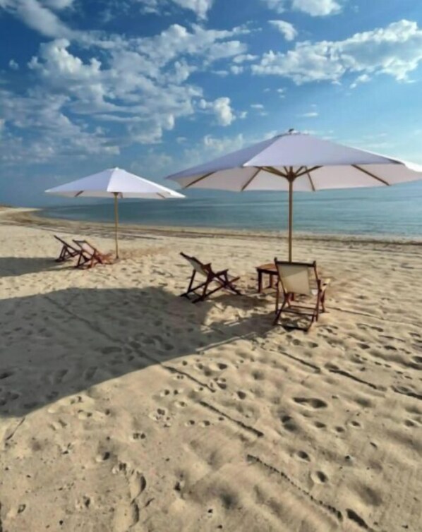 Chaise longue, serviettes de plage