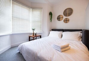 1 bedroom, desk, iron/ironing board, travel cot