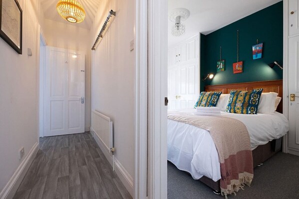 1 bedroom, desk, iron/ironing board, travel crib