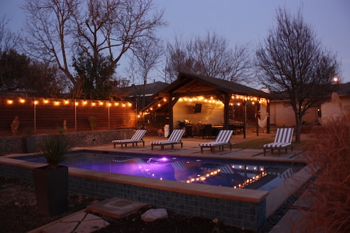 Half acre with huge yard, pool, hot tub, playground, cabana, 15 mins to downtown