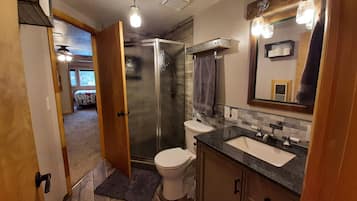 Combined shower/tub, hair dryer, towels, soap