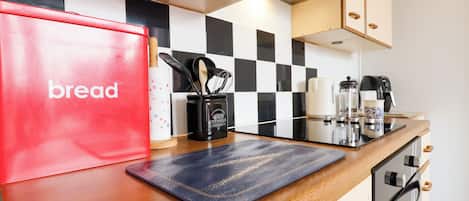 Fridge, dishwasher, electric kettle, cookware/dishes/utensils