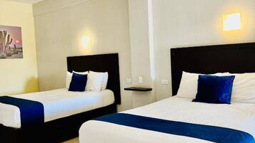 Standard Room, 2 Double Beds | Desk, iron/ironing board, free WiFi, bed sheets