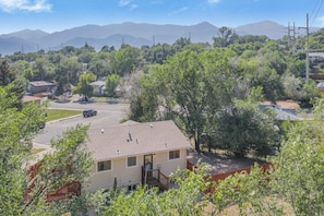 Situated in a scenic neighborhood, this charming home offers a front porch and a small deck.