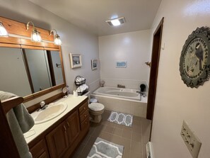 Shower, jetted tub, towels, soap
