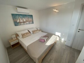 1 dormitorio, tabla de planchar con plancha, wifi gratis y ropa de cama