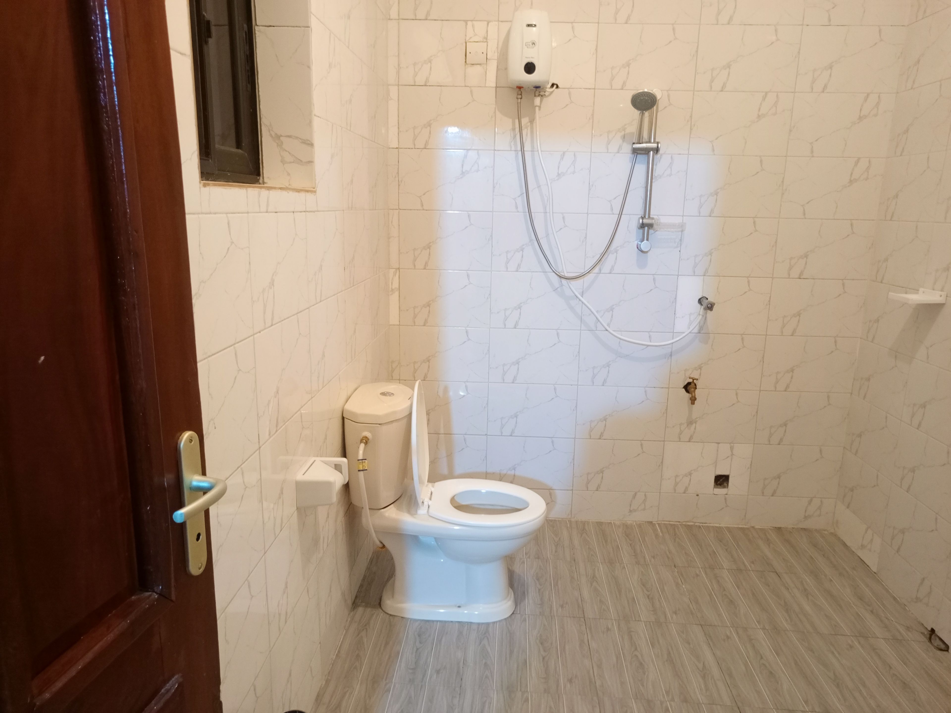 Shower, towels, toilet paper