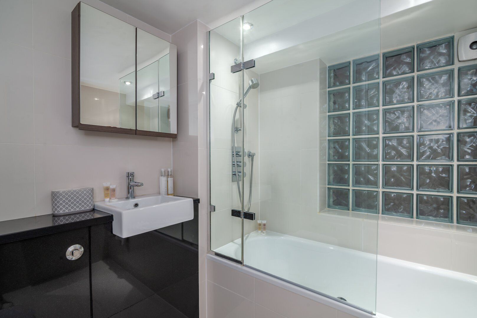 Bathtub, hair dryer, towels