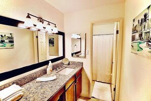 Combined shower/bathtub, hair dryer