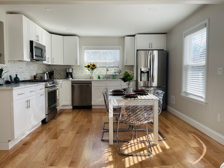 Fridge, microwave, oven, stovetop. Sunny Downtown 2BR w/ Parking