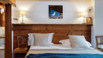 4 dormitorios, tabla de planchar con plancha, wifi y ropa de cama