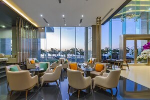 Rooftop bar, beach views, open daily