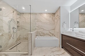 Bathtub, hair dryer, towels