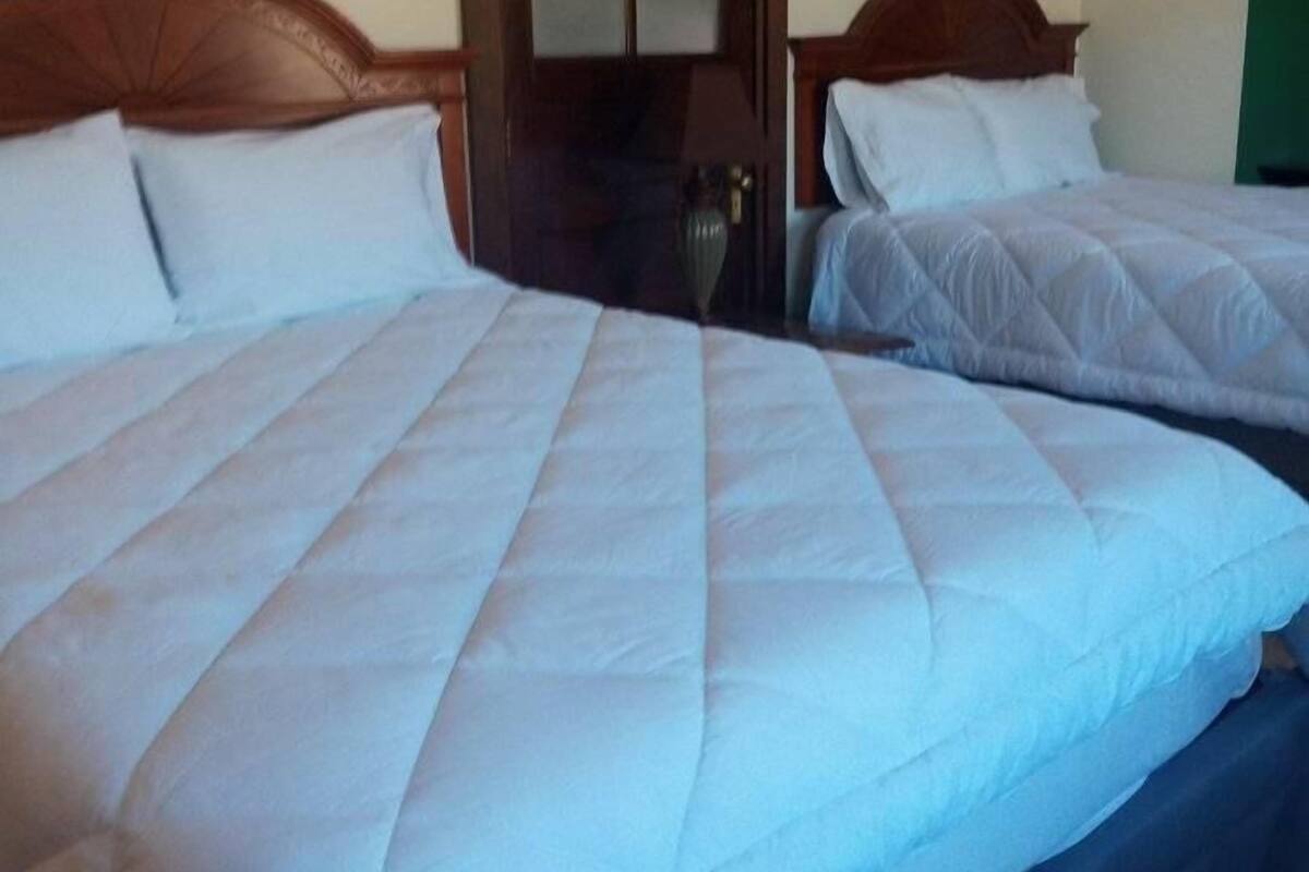 Harding Room | Premium bedding, down duvets, memory-foam beds, bed sheets
