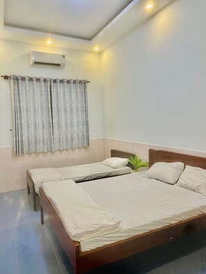 Family Triple Room | WiFi, bed sheets - Le Giang Hotel (Phu Quoc)