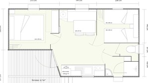 A floor plan of a hotel room with a bathroom, kitchenette, and a terrace.