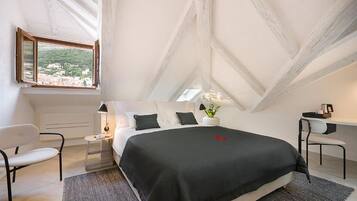 Deluxe Room (Room 2) | Egyptian cotton sheets, premium bedding, memory-foam beds