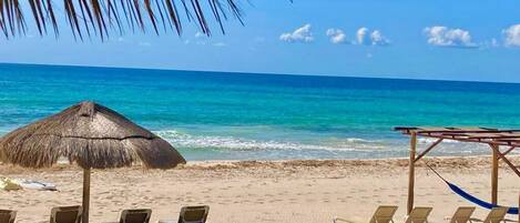 Beach nearby, sun loungers, beach towels